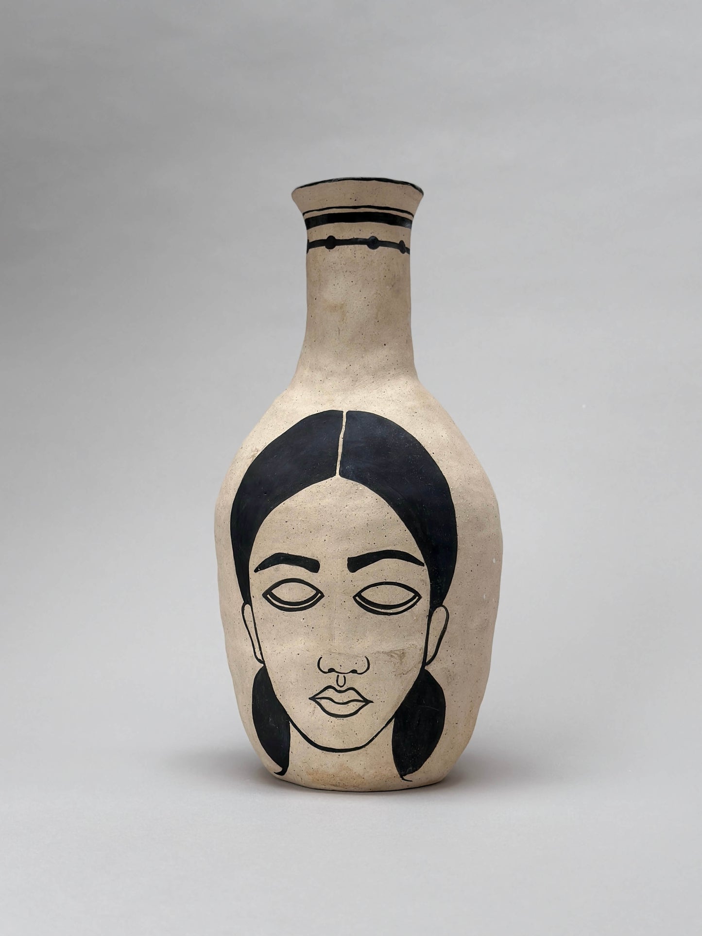 Self-portrait vase (bottle)