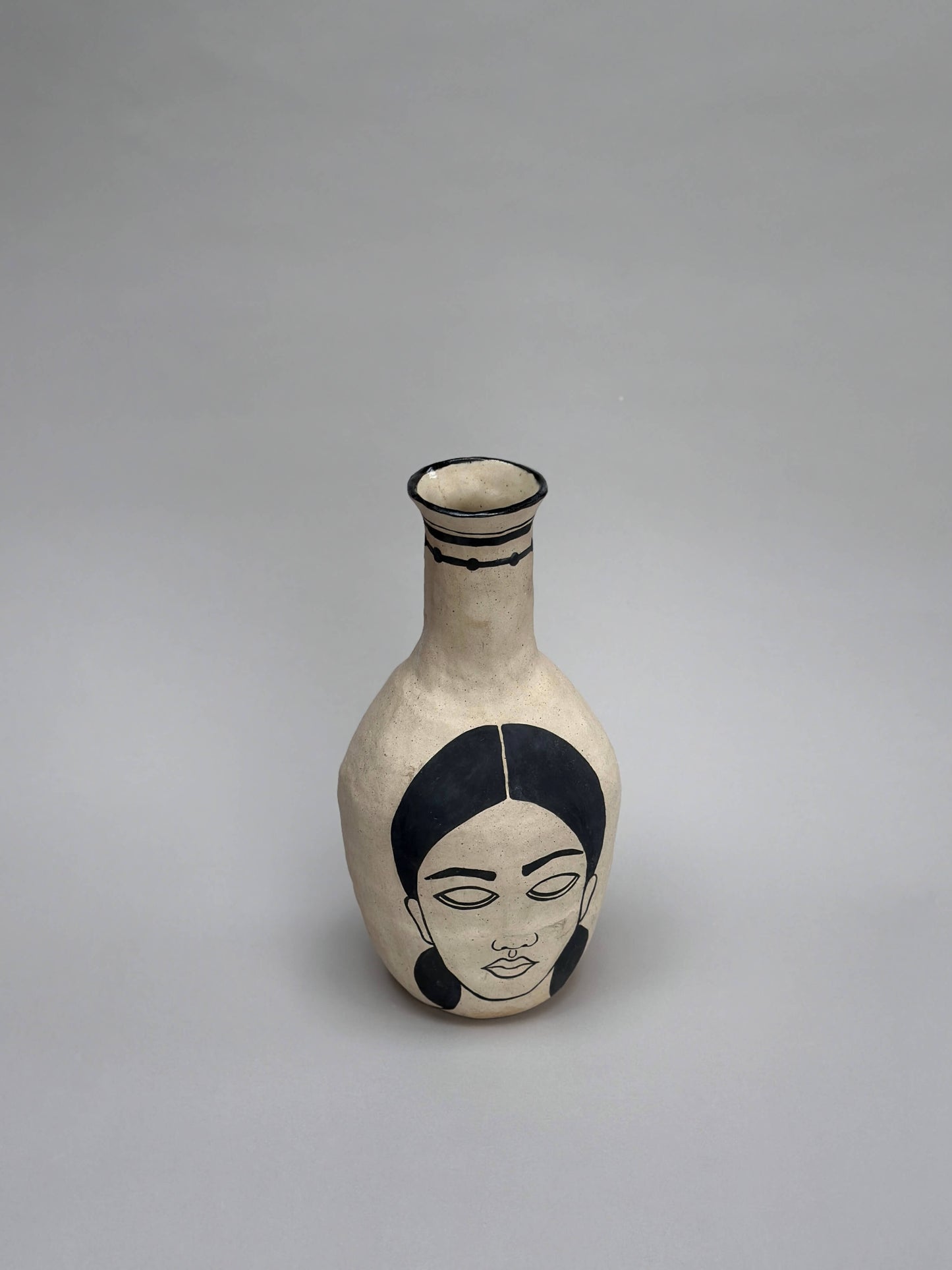 Self-portrait vase (bottle)