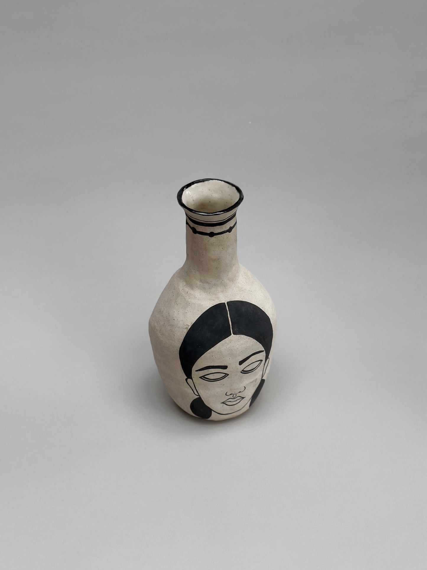 Self-portrait vase (bottle)
