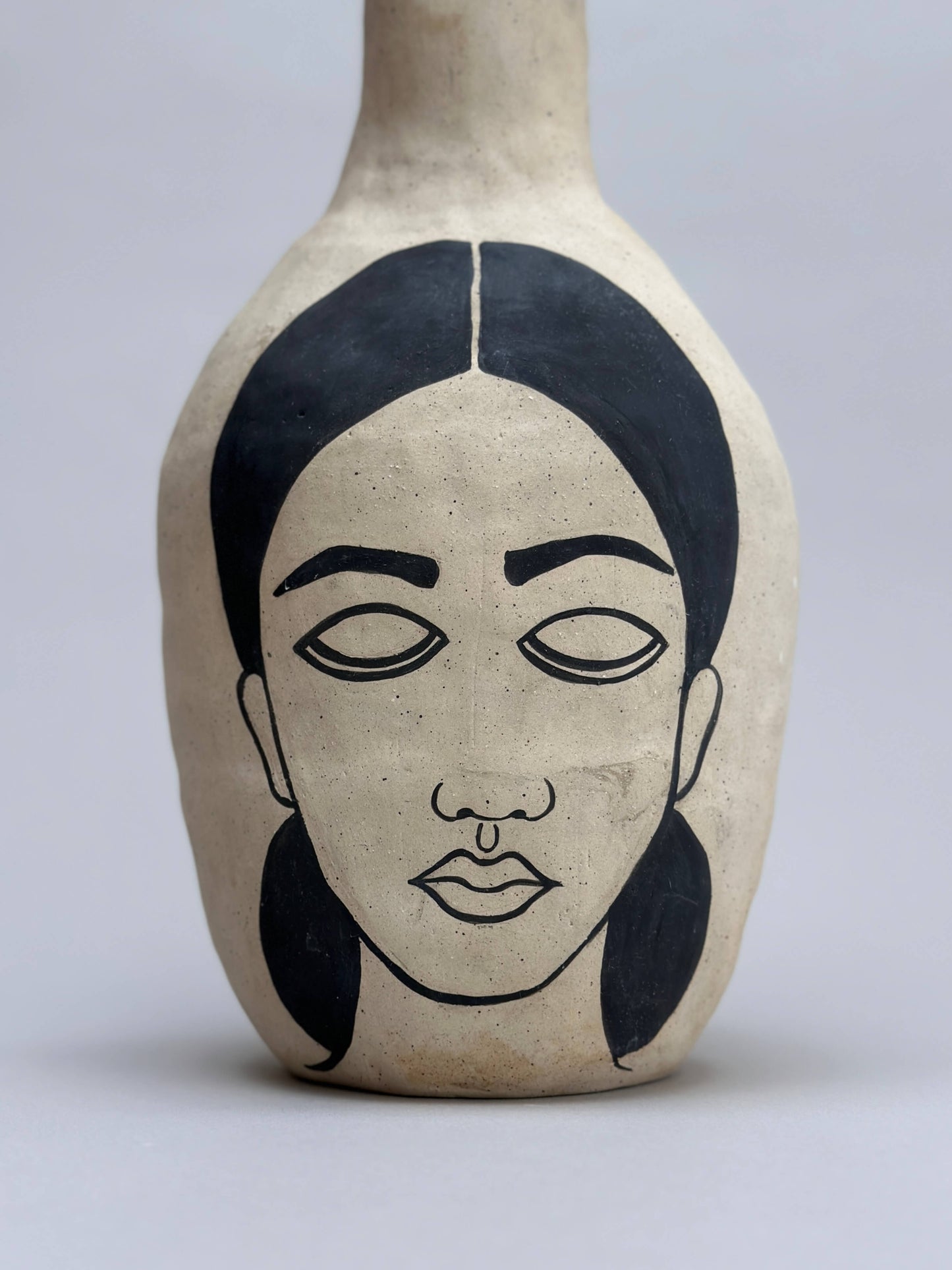 Self-portrait vase (bottle)